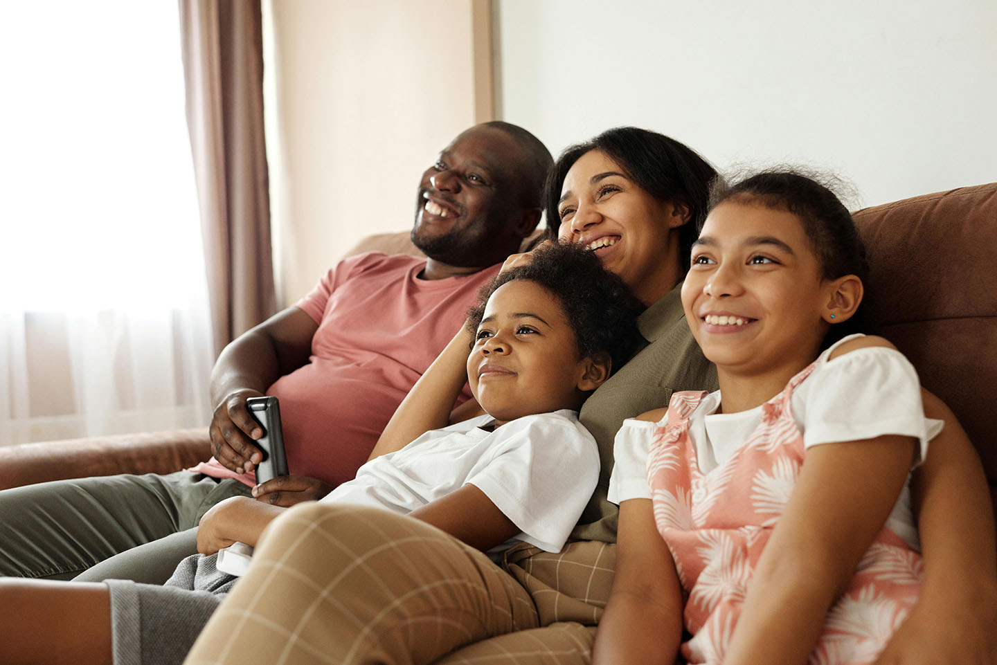 A image of a family watching together